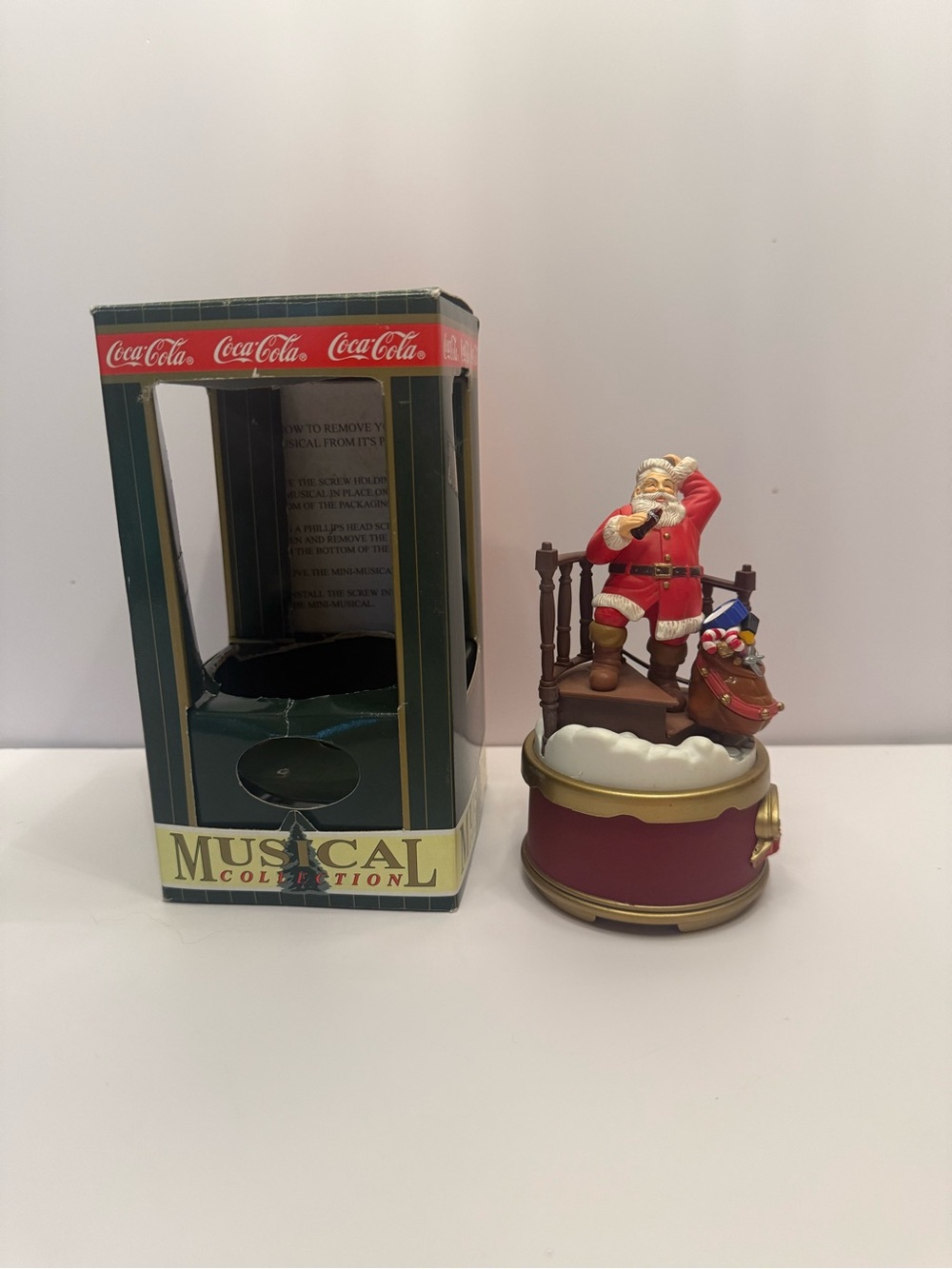 Coca-Cola Santa Musical Figurine in Red, White, Gold
